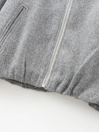 Léa – Bomber élégante en tissu doux gris