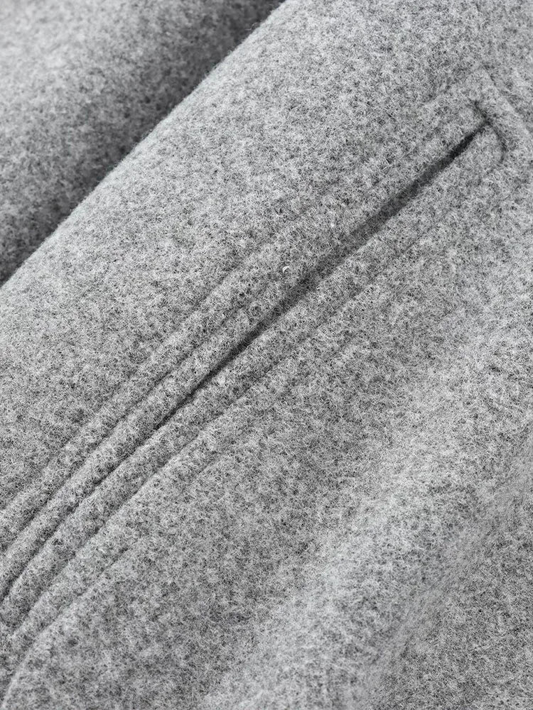 Léa – Bomber élégante en tissu doux gris